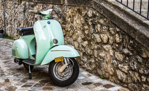 Siena, Italy - October 9:typical italian Vespa Motorscooter (build from Piaggio) at a street in Siena on October 9, 2020