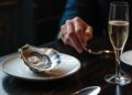 Metti un giorno a tavola ai Parioli tra ostriche e champagne, scoppia la polemica sul pranzo Ater