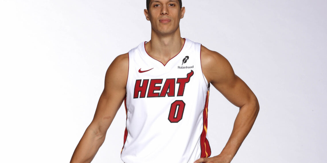 MIAMI, FL - SEPTEMBER 29: Simone Fontecchio #0 of the Miami Heat poses for a portrait during Media Day on September 29, 2025 at Kaseya Center in Miami, Florida. NOTE TO USER: User expressly acknowledges and agrees that, by downloading and or using this photograph, User is consenting to the terms and conditions of the Getty Images License Agreement. Mandatory Copyright Notice: Copyright 2025 NBAE (Photo by Issac Baldizon/NBAE via Getty Images)