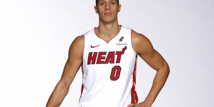 MIAMI, FL - SEPTEMBER 29: Simone Fontecchio #0 of the Miami Heat poses for a portrait during Media Day on September 29, 2025 at Kaseya Center in Miami, Florida. NOTE TO USER: User expressly acknowledges and agrees that, by downloading and or using this photograph, User is consenting to the terms and conditions of the Getty Images License Agreement. Mandatory Copyright Notice: Copyright 2025 NBAE (Photo by Issac Baldizon/NBAE via Getty Images)